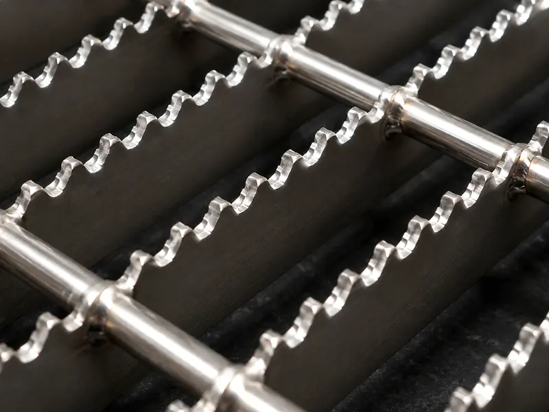 serrated stainless steel grating close up with anti slip teeth